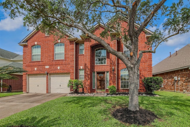 traditional-style home with brick siding, driveway, a front lawn, and a garage