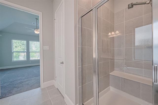 full bath with tile patterned flooring, visible vents, baseboards, a ceiling fan, and a stall shower