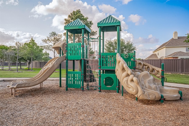 community jungle gym featuring fence