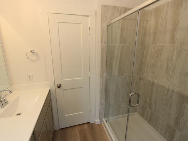 8107 Kay Harbor Dr, Cypress, TX 77433 - full bath featuring vanity, a stall shower, and wood finished floors