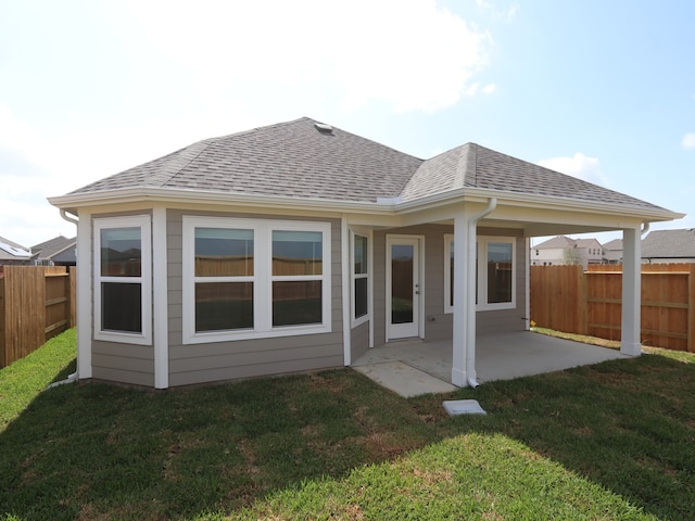 8107 Kay Harbor Dr, Cypress, TX 77433 - back of house with a patio area and a shingled roof