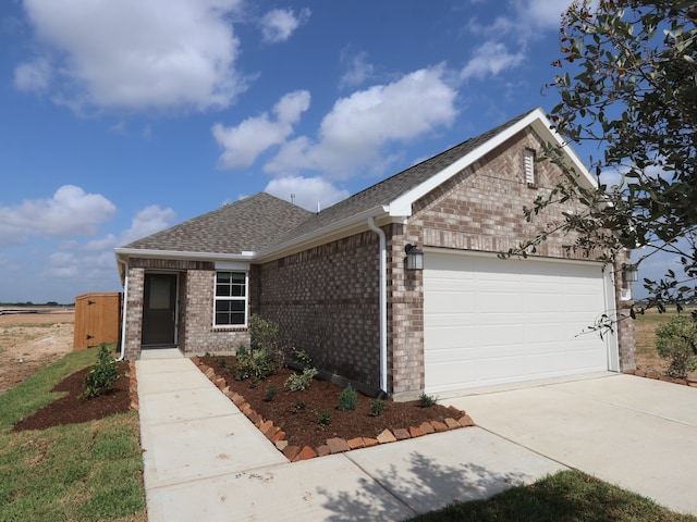 8107 Kay Harbor Dr, Cypress, TX 77433 - single story home with brick siding, an attached garage, a shingled roof, and concrete driveway
