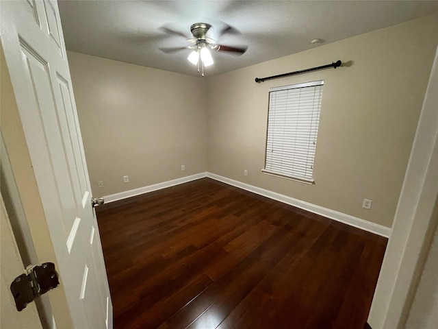 1718 Elgin St, Houston, TX 77004 - unfurnished bedroom with dark wood finished floors, baseboards, and ceiling fan