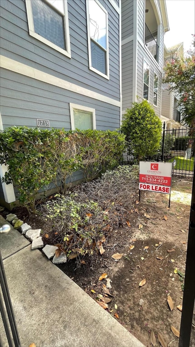 1718 Elgin St, Houston, TX 77004 - view of home's exterior with fence