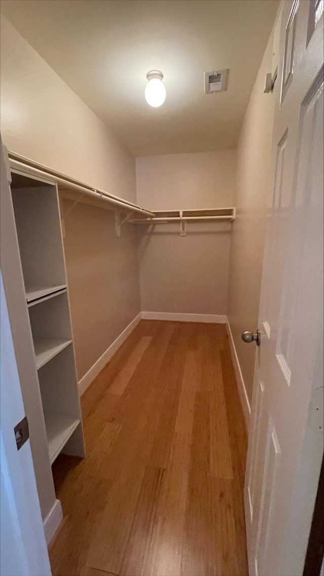 1718 Elgin St, Houston, TX 77004 - spacious closet featuring light wood finished floors