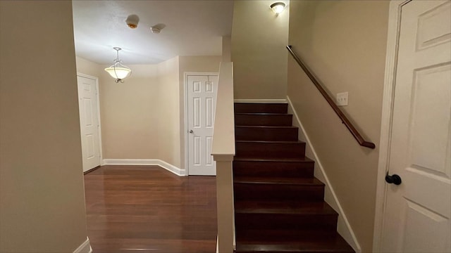1718 Elgin St, Houston, TX 77004 - stairs featuring wood finished floors and baseboards