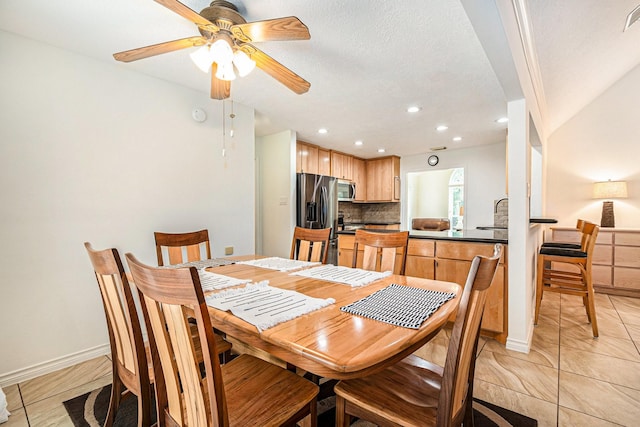 dining area featuring a ceiling fan, baseboards, recessed lighting, and light tile patterned floors
