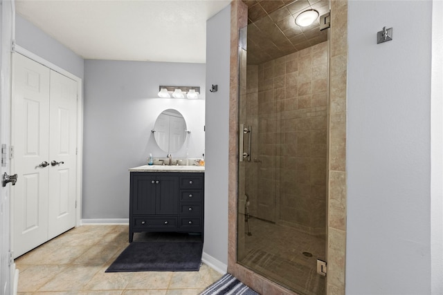 20415 Aspenwilde Dr, Cypress, TX 77433 - full bath featuring vanity, tile patterned flooring, baseboards, and a stall shower