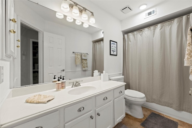 20415 Aspenwilde Dr, Cypress, TX 77433 - bathroom featuring toilet, visible vents, shower / bath combination with curtain, and vanity