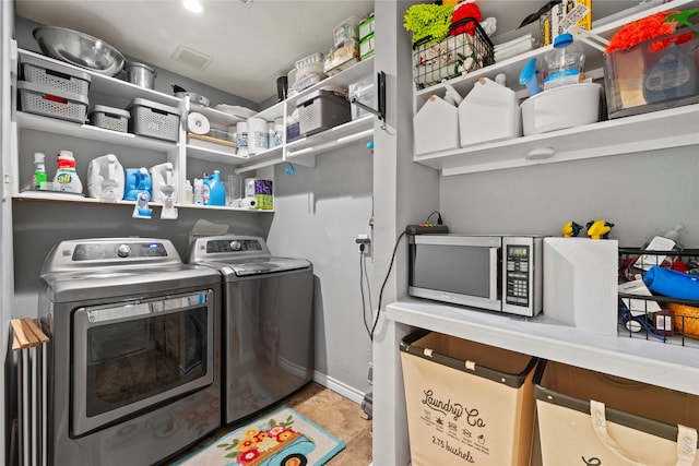 20415 Aspenwilde Dr, Cypress, TX 77433 - laundry area with baseboards, laundry area, and washer and dryer