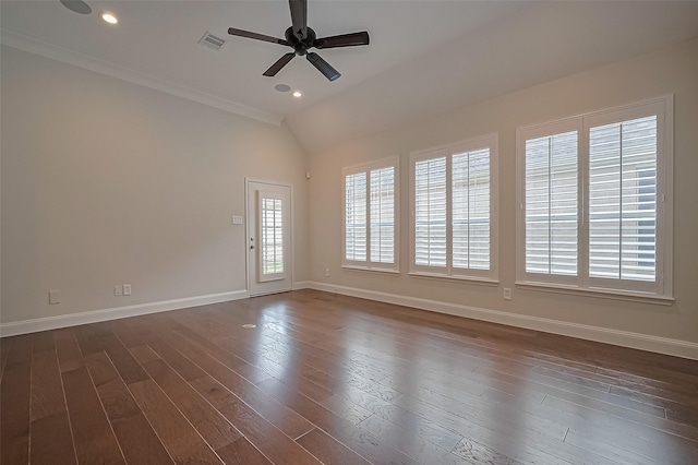 unfurnished room featuring ceiling fan, baseboards, vaulted ceiling, dark wood-type flooring, and visible vents