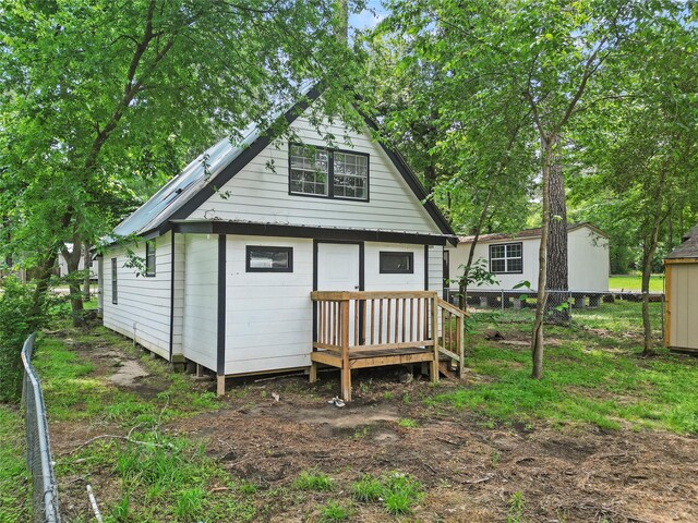 6090 Skylane Dr, Montgomery, TX 77316 - rear view of house with fence