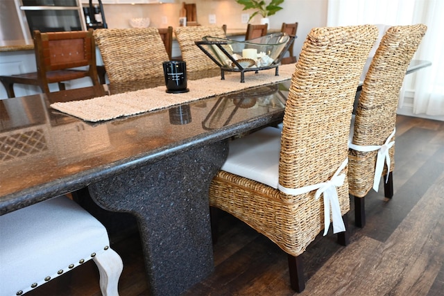 dining space featuring wood finished floors