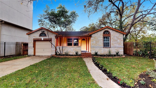 ranch-style home with driveway, a front yard, a garage, fence, and stone siding