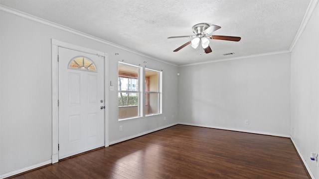 foyer with a ceiling fan, a textured ceiling, visible vents, and wood finished floors
