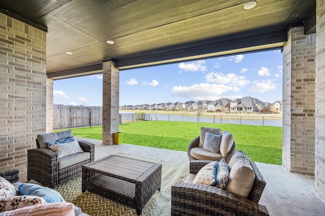 453 Stratus View Ct, Katy, TX 77493 - view of patio / terrace with a residential view, an outdoor hangout area, a water view, and a fenced backyard