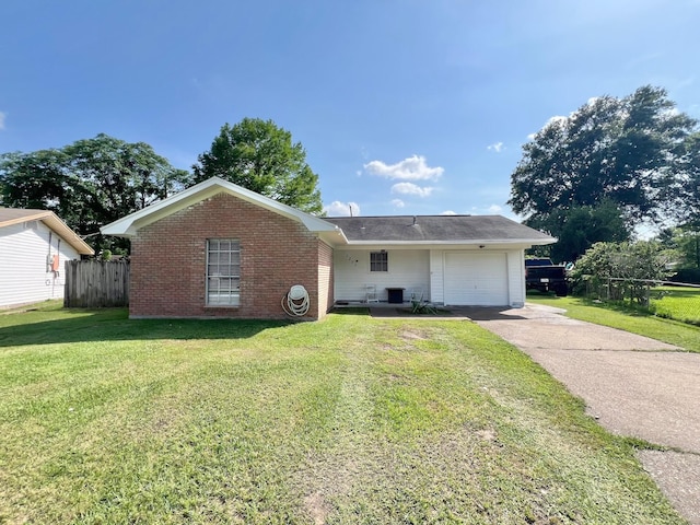ranch-style house with driveway, a front yard, a garage, brick siding, and fence