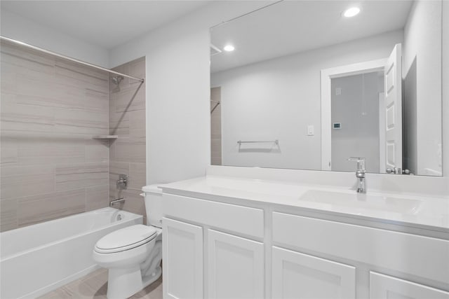 bathroom featuring recessed lighting, shower / bathtub combination, vanity, and toilet
