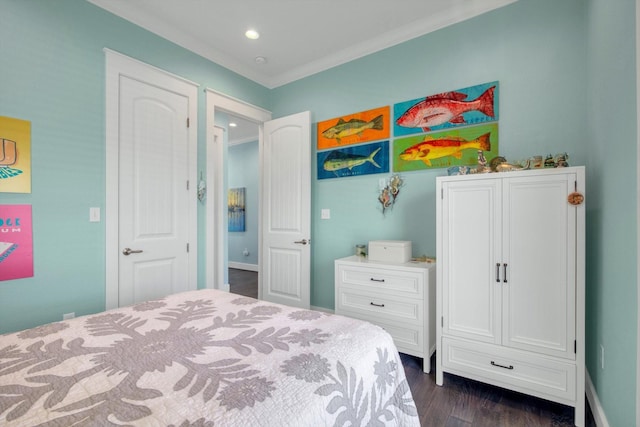 1303 Blue Heron St, Bayou Vista, TX 77563 - bedroom featuring recessed lighting, crown molding, and dark wood-style flooring