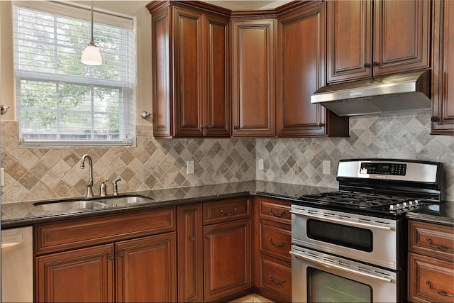 kitchen featuring a sink, decorative backsplash, stainless steel appliances, and under cabinet range hood
