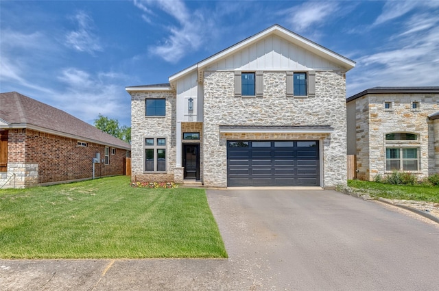 view of front of property featuring an attached garage, a front lawn, stone siding, and aphalt driveway