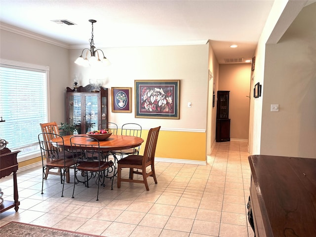 dining space featuring visible vents, baseboards, and light tile patterned floors