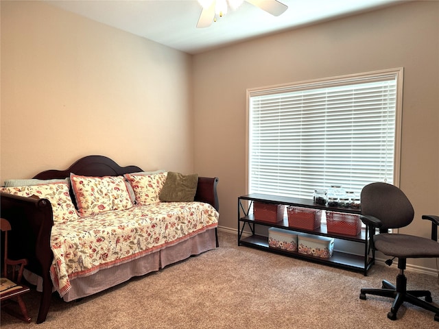 bedroom featuring baseboards, carpet flooring, and ceiling fan