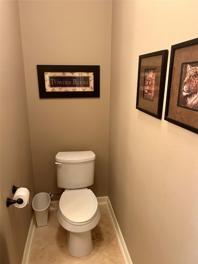 2731 Sea Ledge Dr, Seabrook, TX 77586 - bathroom with tile patterned flooring, toilet, and baseboards