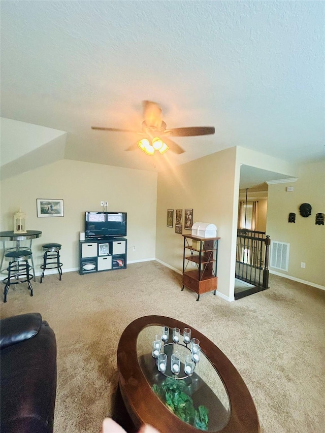 2731 Sea Ledge Dr, Seabrook, TX 77586 - living area featuring carpet flooring, ceiling fan, a textured ceiling, and baseboards