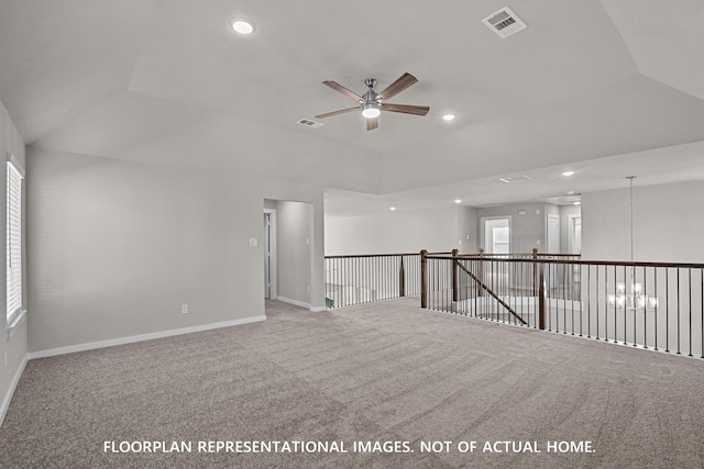 carpeted spare room featuring baseboards, a ceiling fan, recessed lighting, and visible vents