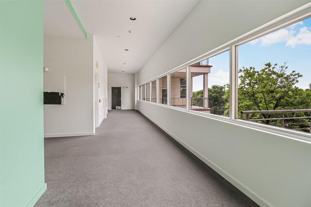 102 Quitman St Unit 301, Houston, TX 77009 - hallway featuring baseboards, carpet floors, and recessed lighting
