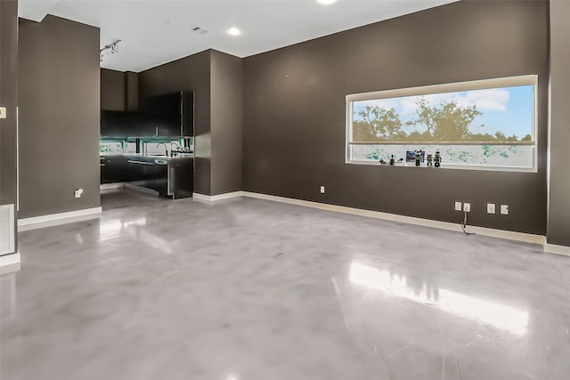 102 Quitman St Unit 301, Houston, TX 77009 - unfurnished room featuring finished concrete flooring and baseboards