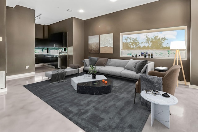 102 Quitman St Unit 301, Houston, TX 77009 - living room with baseboards