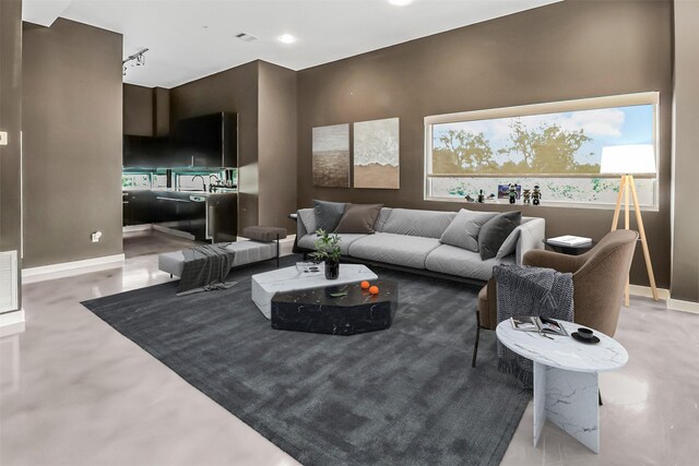 102 Quitman St Unit 301, Houston, TX 77009 - living room with baseboards
