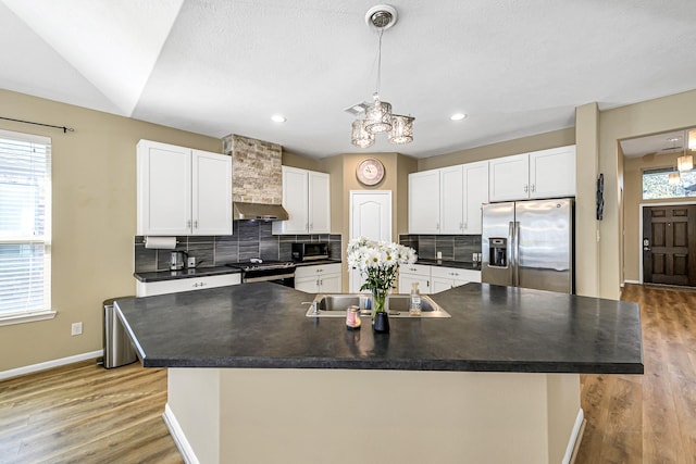 11022 Jacob Crossing Dr, Richmond, TX 77406 - kitchen with an inviting chandelier, dark countertops, tasteful backsplash, a sink, and stainless steel appliances