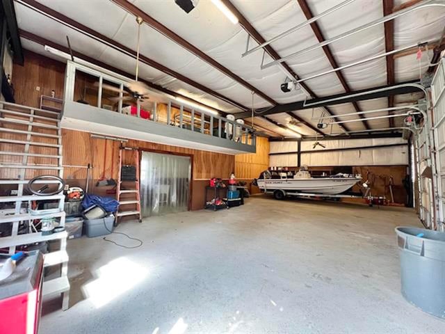 garage with wood walls