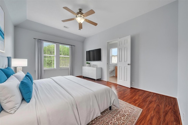 bedroom with visible vents, ceiling fan, wood finished floors, and ensuite bathroom