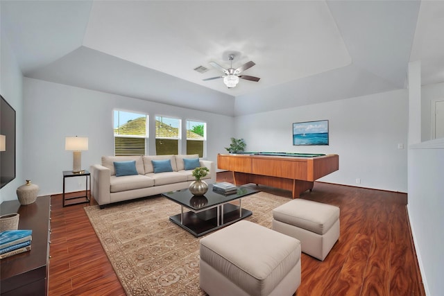living room featuring billiards, ceiling fan, visible vents, wood finished floors, and a tray ceiling