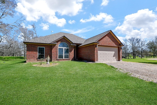 540 Chisolm Trl, Simonton, TX 77476 - ranch-style home with brick siding, an attached garage, roof with shingles, and driveway