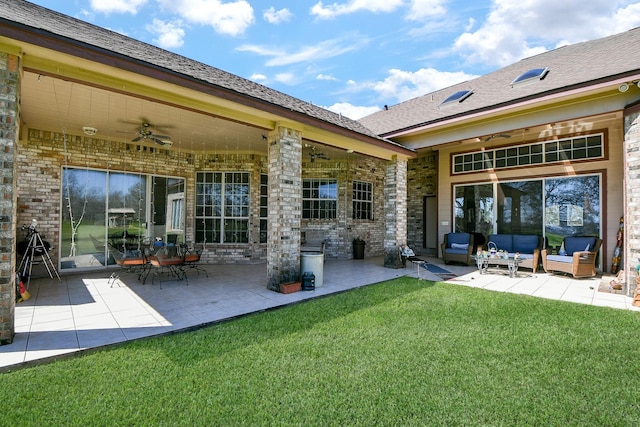 540 Chisolm Trl, Simonton, TX 77476 - rear view of property with a yard, a patio, outdoor lounge area, and a ceiling fan