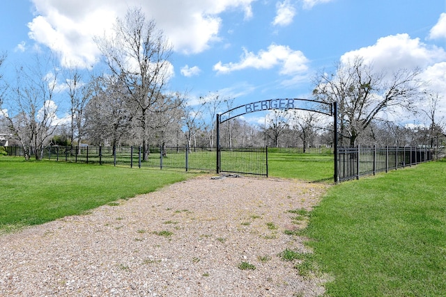 540 Chisolm Trl, Simonton, TX 77476 - view of gate featuring fence and a yard