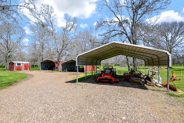 540 Chisolm Trl, Simonton, TX 77476 - view of parking featuring a detached carport and a shed