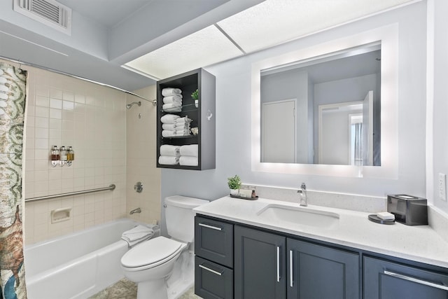 bathroom featuring toilet, visible vents, shower / tub combo with curtain, and vanity