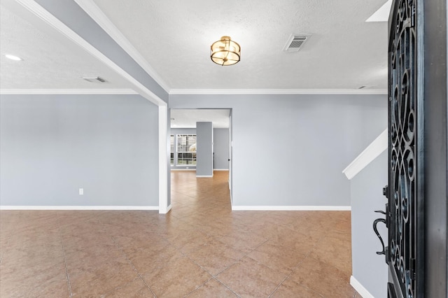 4103 Waterstone Dr, Missouri City, TX 77459 - entryway with visible vents, a textured ceiling, baseboards, and crown molding