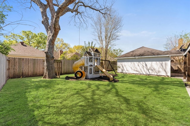 4103 Waterstone Dr, Missouri City, TX 77459 - view of yard featuring a fenced backyard and a playground