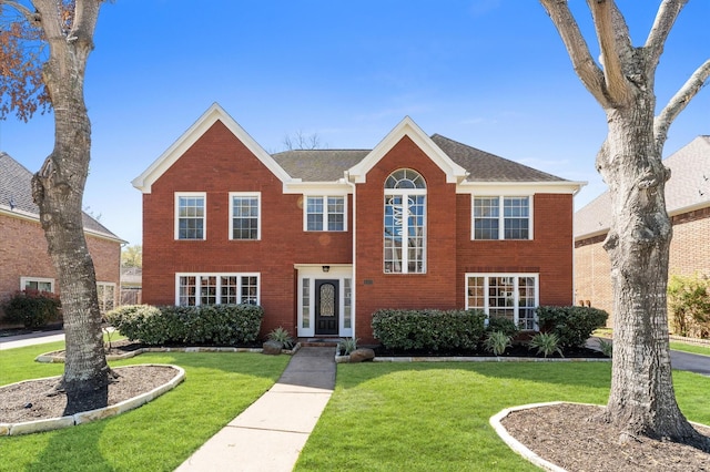 4103 Waterstone Dr, Missouri City, TX 77459 - view of front of house featuring brick siding and a front lawn