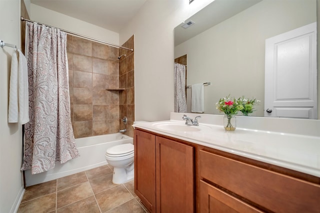 7908 Beryl Ct, Texas City, TX 77591 - bathroom featuring visible vents, tile patterned flooring, vanity, toilet, and shower / tub combo with curtain