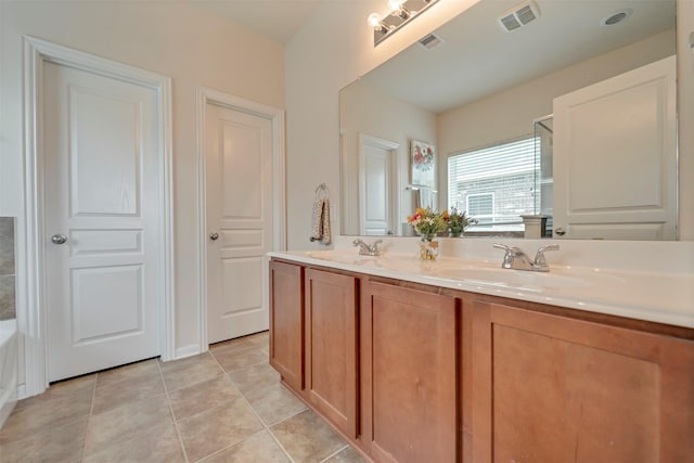 7908 Beryl Ct, Texas City, TX 77591 - full bathroom featuring a sink, tile patterned flooring, double vanity, and visible vents