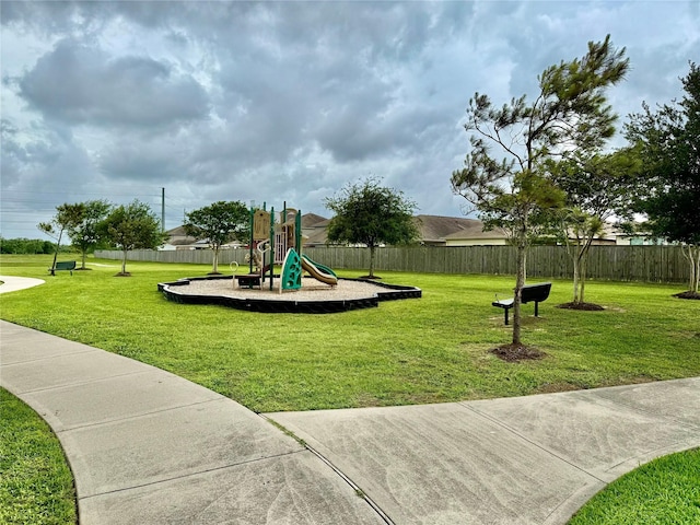 7908 Beryl Ct, Texas City, TX 77591 - community jungle gym featuring fence and a yard