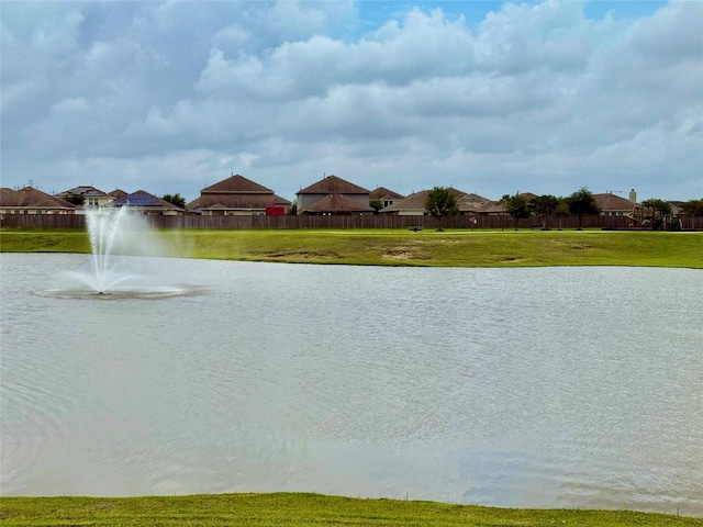 7908 Beryl Ct, Texas City, TX 77591 - view of water feature featuring fence and a residential view